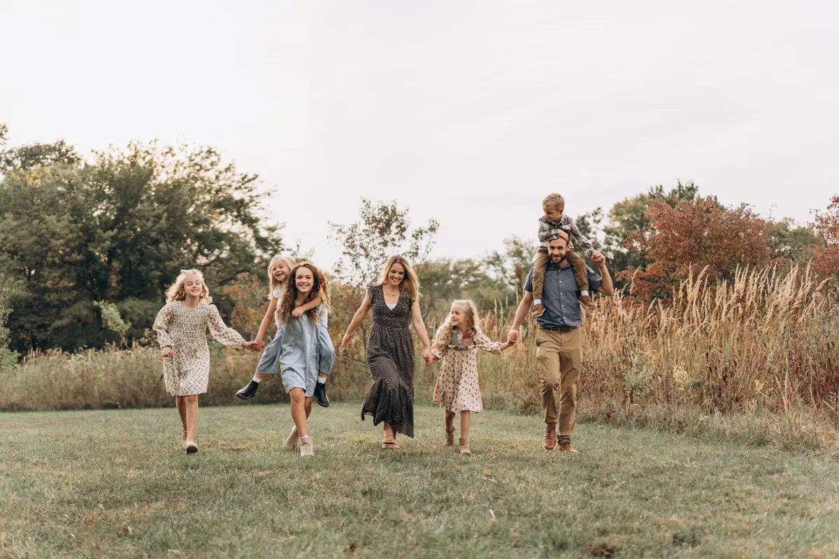 A multigenerational family walking together outdoors