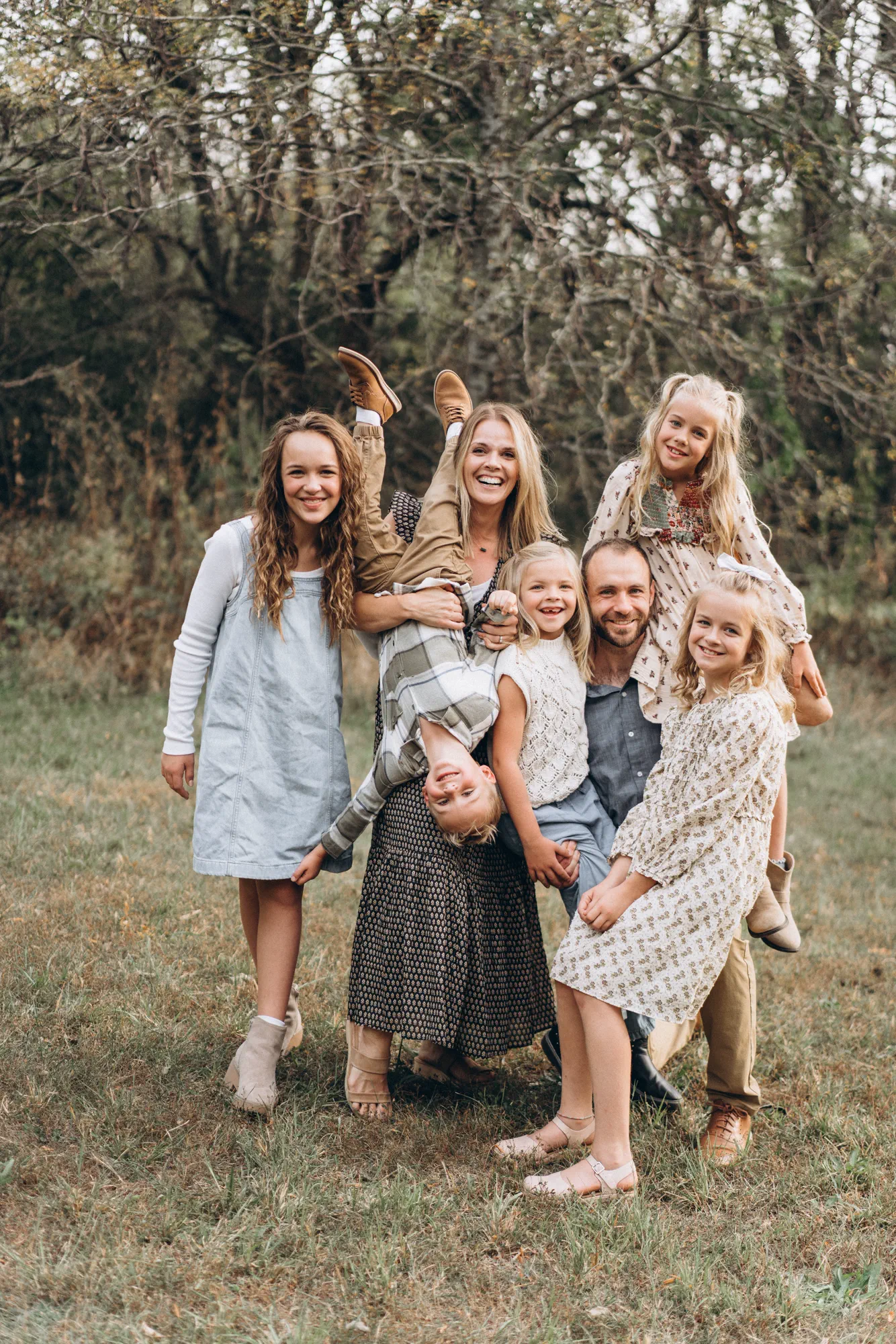 A family sharing an informal moment outdoors