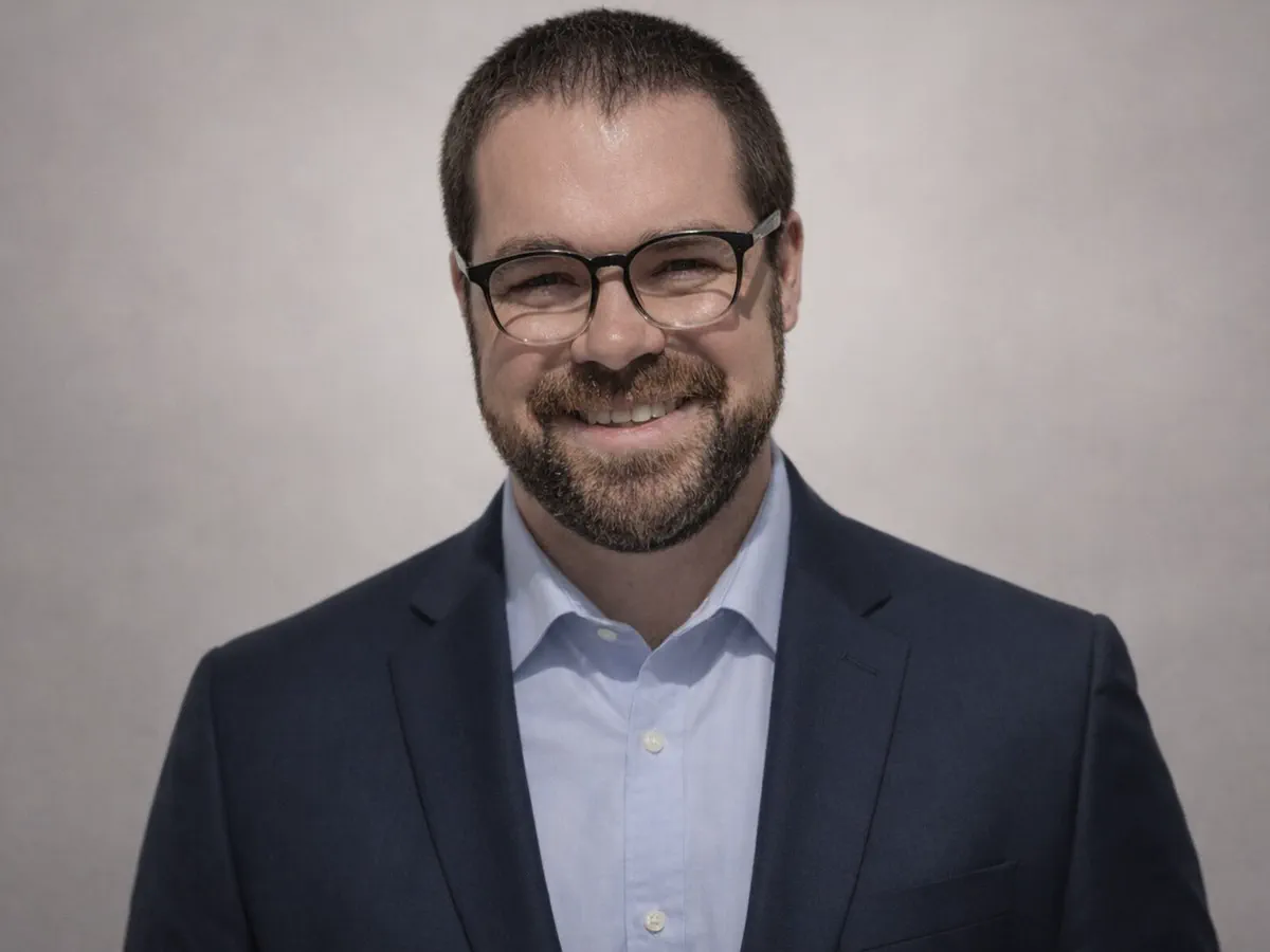 Curtis Evans, Director of Client Strategy